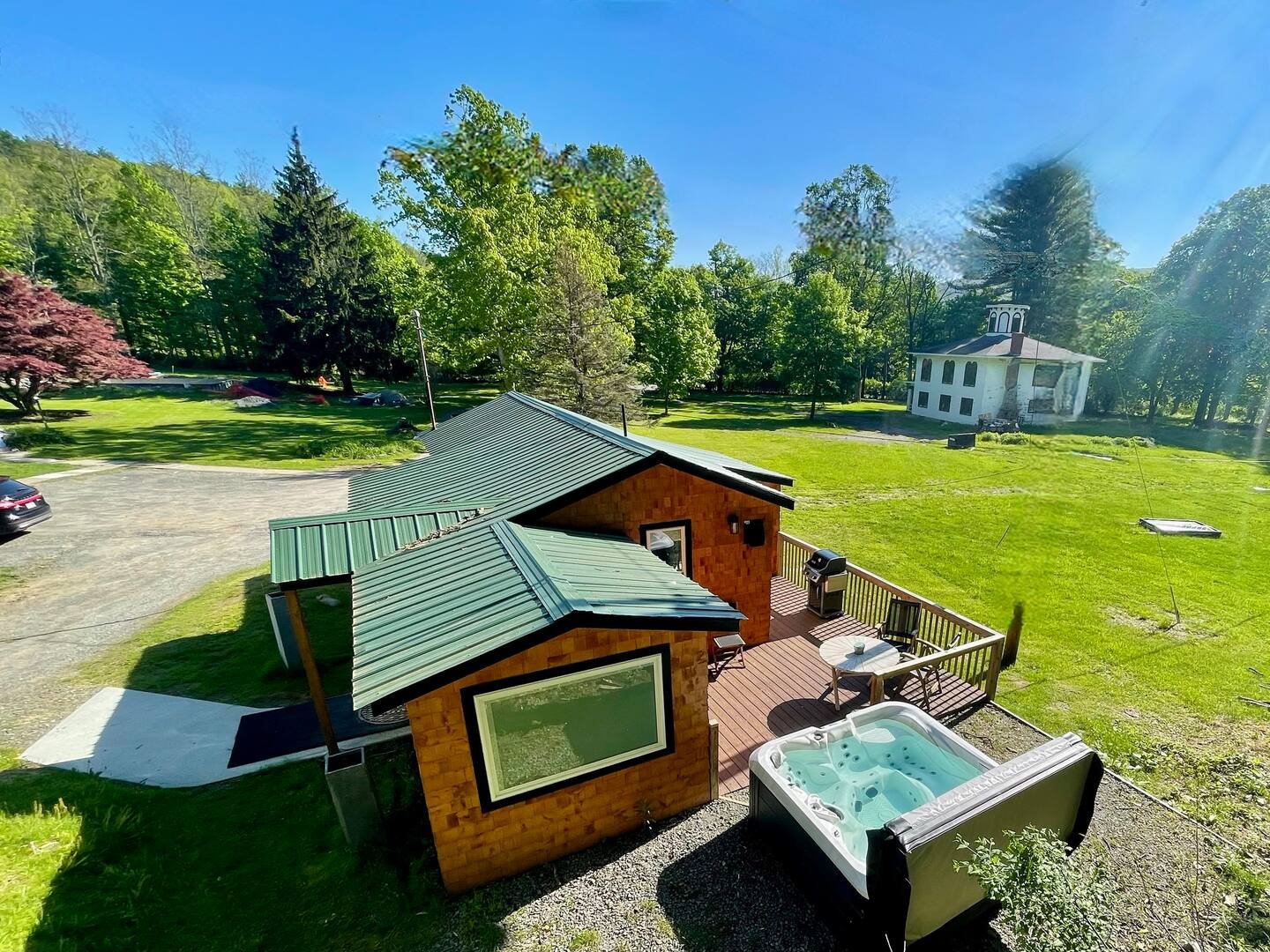 Hudson Valley guest house with a hot tub and wooded grounds