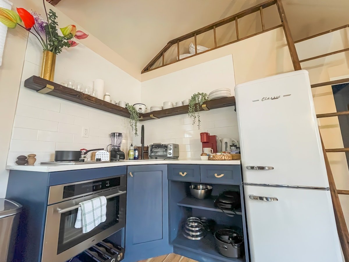 Sunlit kitchen inside Catskill Tiny Home for a Hudson Valley romantic getaway in Ellenville